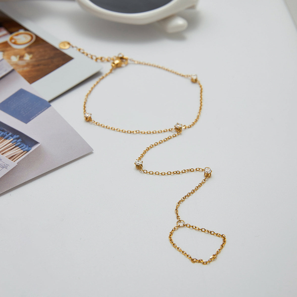 ZIRCONIA HAND CHAIN BRACELET | GOLD PLATED